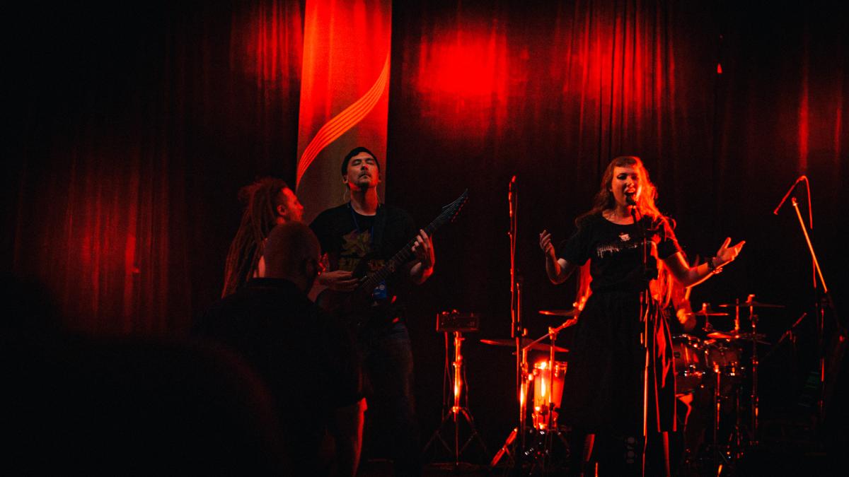 Gunderslam, Mahn, Kat, and Roque (mostly hidden) performing the end of "Prelude"